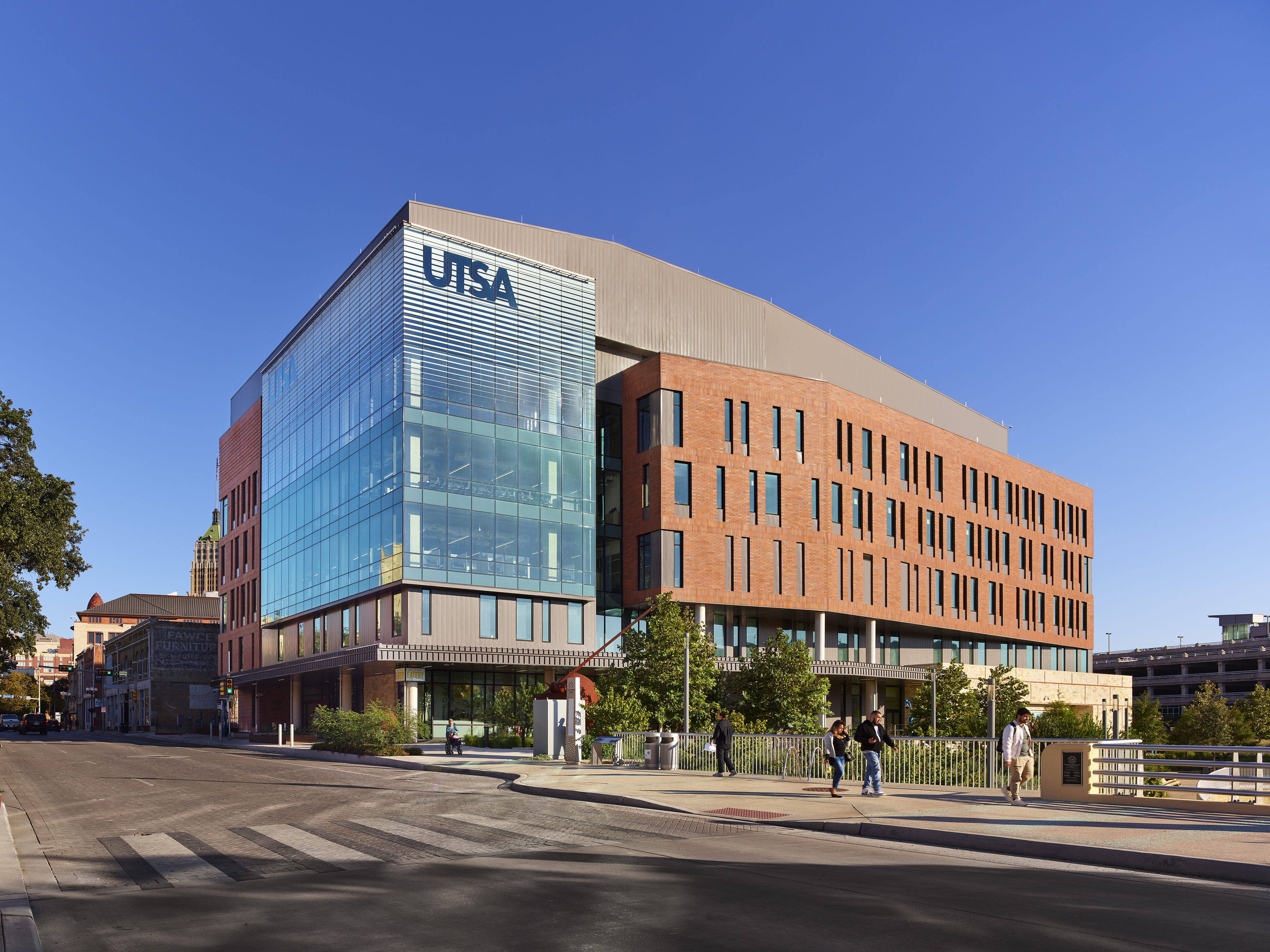 UTSA Building at the downtown campus with people walking outside