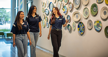 College of AI, Cyber and Computing students with a Meals on Wheels mentor