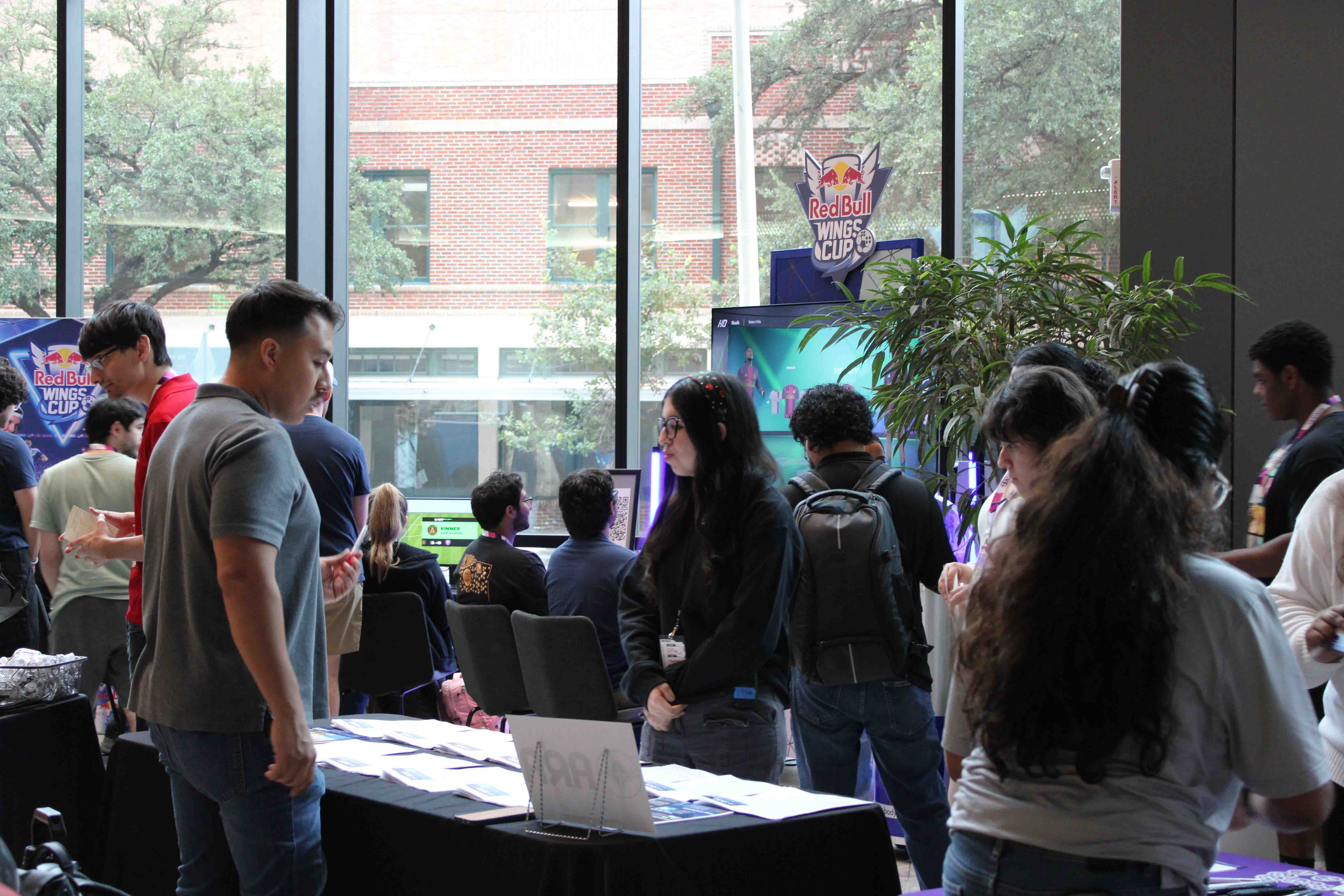 Students at a career fair at RowdyHacks XII.